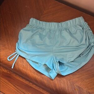 Blue Athletic Shorts with Elastic Waistband and Adjustable Sides